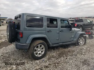 2015 Jeep Wrangler Unlimited Sahara with VIN 1C4BJWEG6FL640316, listed as a Copart auction lot 48024865 with 128,317 mi miles and Salvage Title. Bid and sale history available at carsss.com. Image 3.
