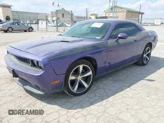 2014 Dodge Challenger R/T z VIN 2C3CDYBT0EH143576, wystawiony jako IAAI lot #42333984 z przebiegiem 189 874 mil mil oraz . Historia ofert i sprzedaży dostępna na DreamBid. Obrazek 2.