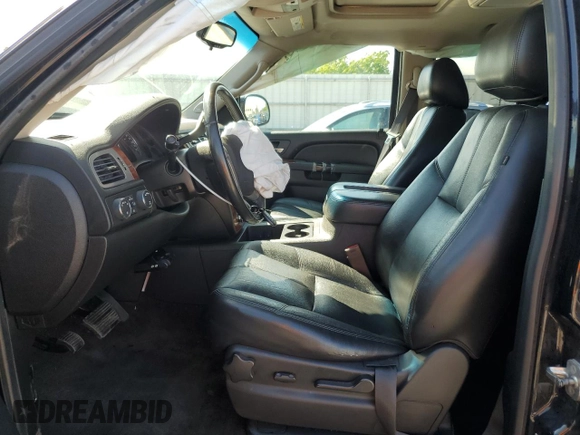 2013 Chevrolet Suburban LT with VIN 1GNSKJE70DR138631, listed as a Copart auction lot 57778185 with 176,934 mi miles and Salvage title. Bid and sale history available at DreamBid. Image 7.
