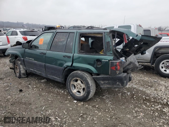 1997 Jeep Grand Cherokee Laredo with VIN 1J4GZ58S5VC720174, listed as a Copart auction lot 44169635 with Not provided miles and Salvage title. Bid and sale history available at DreamBid. Image 2.