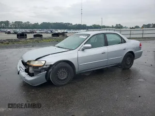 2001 Honda Accord LX with VIN 1HGCG16451A065626, listed as a Copart auction lot 59731685 with 200,880 mi miles and Salvage title. Bid and sale history available at DreamBid. Image 1.