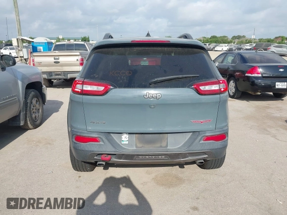 2014 Jeep Cherokee Trailhawk z VIN 1C4PJMBS2EW161276, wystawiony jako IAAI lot #42283358 z przebiegiem 135 201 mil mil oraz . Historia ofert i sprzedaży dostępna na DreamBid. Obrazek 16.