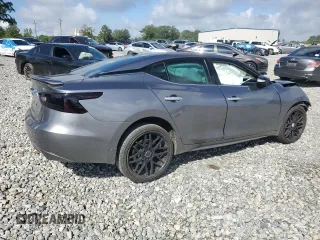 2016 Nissan Maxima SL with VIN 1N4AA6AP7GC386639, listed as a Copart auction lot 61502355 with Not provided miles and Salvage title. Bid and sale history available at DreamBid. Image 3.