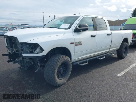 2013 Ram 2500 SLT with VIN 3C6TR5JT5DG517635, listed as a IAAI auction lot 40950960 with 99,372 mi miles and . Bid and sale history available at DreamBid. Image 2.