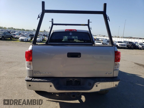 2013 Toyota Tundra с VIN 5TFDY5F10DX284847, выставлен на аукционе Copart как лот 52356135 с пробегом 80 774 миль миль и Списание • Salvage title. История ставок и продаж доступна на DreamBid. Изображение 6.