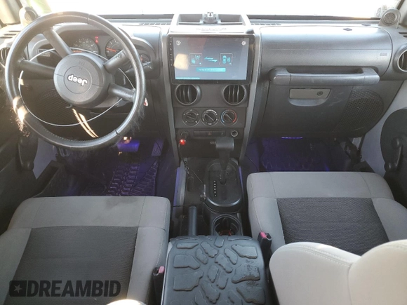 2008 Jeep Wrangler Unlimited X with VIN 1J4GB39138L517920, listed as a Copart auction lot 76541144 with 213,002 mi miles and Salvage Title. Bid and sale history available at DreamBid. Image 8.