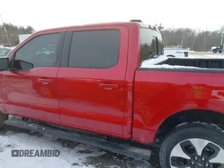 2023 Ford F-150 Lightning Pro with VIN 1FT6W1EV2PWG16485, listed as a IAAI auction lot 41496664 with 7,171 mi miles and . Bid and sale history available at DreamBid. Image 14.