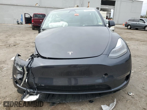 2024 Tesla Model Y с VIN 7SAYGDED1RF092027, выставлен на аукционе Copart как лот 51655485 с пробегом 22 010 миль миль и Списание • Salvage title. История ставок и продаж доступна на DreamBid. Изображение 5.