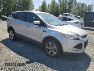 2013 Ford Escape SE z VIN 1FMCU9GX8DUC36592, wystawiony jako Copart lot #60106585 z przebiegiem 220 867 mil mil oraz Czysty tytuł • Clean title. Historia ofert i sprzedaży dostępna na DreamBid. Obrazek 4.