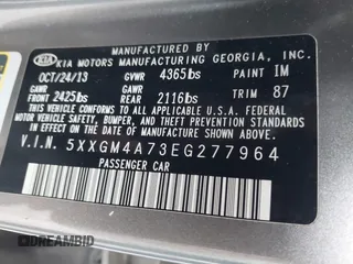 2014 Kia Optima LX with VIN 5XXGM4A73EG277964, listed as a IAAI auction lot 42079663 with 91,009 mi miles. Bid and sale history available at carsss.com. Image 9.