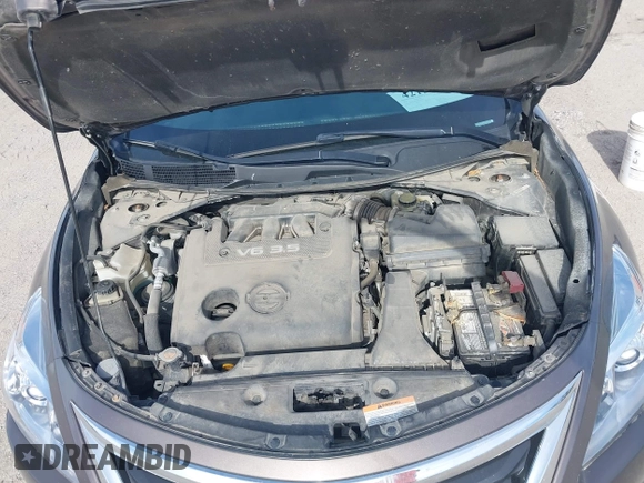 2013 Nissan Altima SV z VIN 1N4BL3AP4DN567890, wystawiony jako IAAI lot #42128612 z przebiegiem 169 491 mil mil oraz . Historia ofert i sprzedaży dostępna na DreamBid. Obrazek 10.