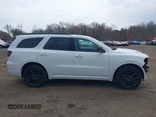 2018 Dodge Durango GT with VIN 1C4RDJDG4JC409238, listed as a IAAI auction lot 41876715 with 111,579 mi miles and . Bid and sale history available at DreamBid. Image 13.