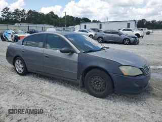 2006 Nissan Altima S with VIN 1N4AL11D76C205718, listed as a Copart auction lot 60190495 with 194,247 mi miles and Salvage title. Bid and sale history available at DreamBid. Image 4.