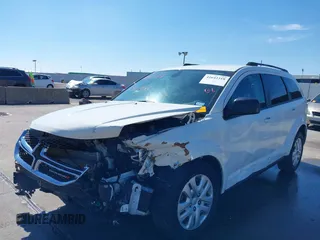2019 Dodge Journey SE Value with VIN 3C4PDCAB1KT868065, listed as a IAAI auction lot 41642318 with 97,735 mi miles and . Bid and sale history available at DreamBid. Image 6.