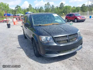 2014 Dodge Grand Caravan SXT with VIN 2C4RDGCG6ER170132, listed as a IAAI auction lot 42026919 with 219,034 mi miles. Bid and sale history available at carsss.com. Image 1.