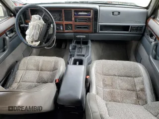1996 Jeep Cherokee Country with VIN 1J4FJ78S3TL180304, listed as a Copart auction lot 45291925 with 162,876 mi miles and Salvage Title. Bid and sale history available at carsss.com. Image 8.
