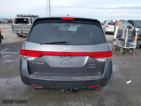 2014 Honda Odyssey Touring with VIN 5FNRL5H94EB001076, listed as a IAAI auction lot 41314546 with NaN miles. Bid and sale history available at carsss.com. Image 16.