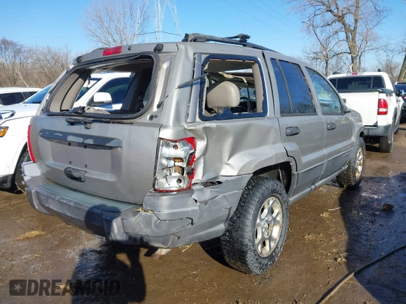 2001 Jeep Grand Cherokee Laredo with VIN 1J4GX48S51C735316, listed as a IAAI auction lot 41752349 with 214,101 mi miles and . Bid and sale history available at DreamBid. Image 4.