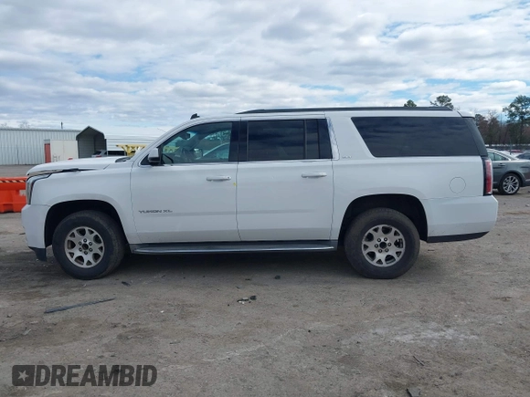 2015 GMC Yukon XL SLT with VIN 1GKS1HKC7FR126375, listed as a IAAI auction lot 41689017 with 218,622 mi miles. Bid and sale history available at carsss.com. Image 14.