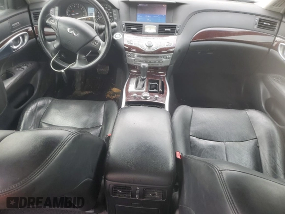 2013 Infiniti M z VIN JN1BY1AR5DM604133, wystawiony jako Copart lot #56890095 z przebiegiem 202 593 mil mil oraz Szkoda całkowita • Salvage title. Historia ofert i sprzedaży dostępna na DreamBid. Obrazek 8.