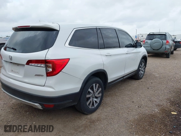 2022 Honda Pilot EX-L с VIN 5FNYF6H57NB015222, выставлен на аукционе IAAI как лот 42072651 с пробегом 40 151 миль миль и . История ставок и продаж доступна на DreamBid. Изображение 4.
