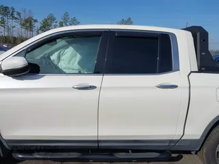 2018 Honda Ridgeline RTL-E with VIN 5FPYK3F71JB001753, listed as a IAAI auction lot 41510248 with 84,551 mi miles and . Bid and sale history available at DreamBid. Image 14.