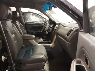 2007 Honda Pilot EX-L with VIN 5FNYF18677B017230, listed as a IAAI auction lot 41727853 with 257,527 mi miles and . Bid and sale history available at DreamBid. Image 5.