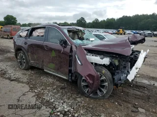 2024 Mazda CX-90 Premium with VIN JM3KKDHAXR1107854, listed as a Copart auction lot 60714955 with 7,802 mi miles and Salvage title. Bid and sale history available at DreamBid. Image 4.