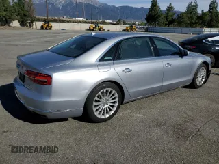 2015 Audi A8 L 4.0T with VIN WAU32AFD6FN039126, listed as a Copart auction lot 47020945 with 137,133 mi miles and Salvage Title. Bid and sale history available at carsss.com. Image 3.