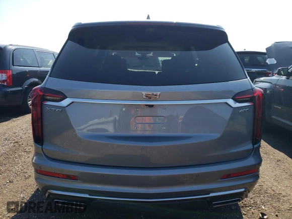 2024 Cadillac XT6 FWD Premium Luxury with VIN 1GYKPCRS7RZ736818, listed as a Copart auction lot 67768804 with 7,145 mi miles and Salvage Title. Bid and sale history available at carsss.com. Image 6.