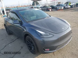 2023 Tesla Model Y Long Range with VIN 7SAYGDEE7PA196038, listed as a IAAI auction lot 41459601 with 16,489 mi miles and . Bid and sale history available at DreamBid. Image 1.