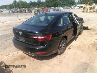 2021 Volkswagen Jetta S z VIN 3VWC57BU1MM038232, wystawiony jako IAAI lot #42196294 z przebiegiem 54 880 mil mil oraz . Historia ofert i sprzedaży dostępna na DreamBid. Obrazek 4.