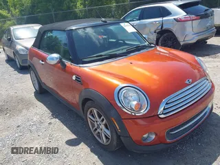 2011 MINI Convertible with VIN WMWZN3C59BTZ78139, listed as a IAAI auction lot 42656318 with 73,138 mi miles and . Bid and sale history available at DreamBid. Image 1.