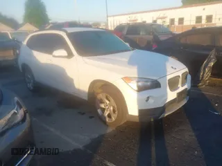 2014 BMW X1 sDrive28i with VIN WBAVM1C52EVW51547, listed as a IAAI auction lot 41985143 with 97,355 mi miles. Bid and sale history available at carsss.com. Image 1.