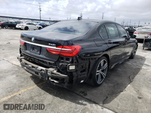 2016 BMW 7 Series 740i with VIN WBA7E2C54GG548312, listed as a Copart auction lot 45716263 with 74,249 mi miles. Bid and sale history available at carsss.com. Image 3.