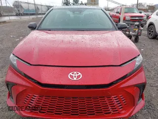 2025 Toyota Camry LE with VIN 4T1DAACK6SU052760, listed as a IAAI auction lot 41923980 with 5,586 mi miles and . Bid and sale history available at DreamBid. Image 12.
