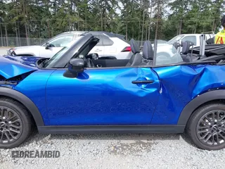 2025 MINI Convertible with VIN WMW23GX01S2X08664, listed as a IAAI auction lot 42506008 with 1,641 mi miles and . Bid and sale history available at DreamBid. Image 15.
