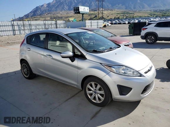 2013 Ford Fiesta S с VIN 3FADP4TJ9DM226913, выставлен на аукционе Copart как лот 55515245 с пробегом 107 947 миль миль и Списание • Salvage title. История ставок и продаж доступна на DreamBid. Изображение 4.