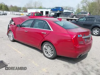 2015 Cadillac CTS Luxury AWD z VIN 1G6AX5SX5F0129130, wystawiony jako IAAI lot #42147471 z przebiegiem 93 678 mil mil oraz . Historia ofert i sprzedaży dostępna na DreamBid. Obrazek 3.