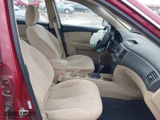 2009 Kia Optima LX with VIN KNAGE228295292892, listed as a IAAI auction lot 41812221 with 179,276 mi miles. Bid and sale history available at carsss.com. Image 5.