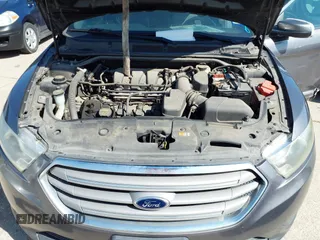 2013 Ford Taurus SEL with VIN 1FAHP2E81DG229444, listed as a IAAI auction lot 42095216 with 211,812 mi miles and . Bid and sale history available at carsss.com. Image 10.