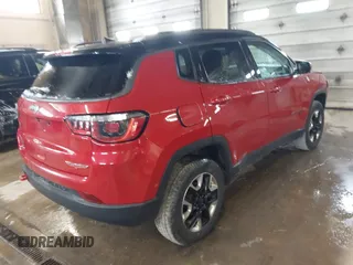 2018 Jeep Compass Trailhawk with VIN 3C4NJDDB5JT307366, listed as a IAAI auction lot 41839273 with 103,585 mi miles and . Bid and sale history available at carsss.com. Image 4.