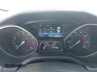 2017 Ford Focus SE with VIN 1FADP3F21HL213563, listed as a IAAI auction lot 42175326 with 101,767 mi miles and . Bid and sale history available at DreamBid. Image 7.