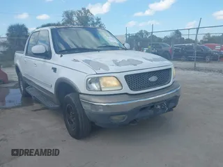 2002 Ford F-150 XLT with VIN 1FTRW08L02KA10457, listed as a IAAI auction lot 41704625 with 151,072 mi miles. Bid and sale history available at carsss.com. Image 1.