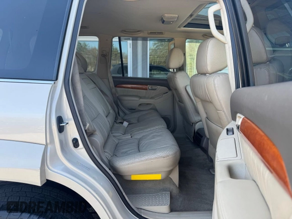 2003 Lexus GX 470 z VIN JTJBT20X830007160, wystawiony jako Copart lot #58235005 z przebiegiem 237 159 mil mil oraz Czysty tytuł • Clean title. Historia ofert i sprzedaży dostępna na DreamBid. Obrazek 6.