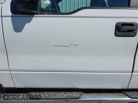2007 Ford F-150 STX with VIN 1FTRX14W87FA14579, listed as a IAAI auction lot 40503694 with 164,718 mi miles. Bid and sale history available at carsss.com. Image 6.