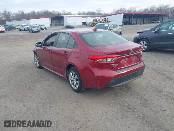 2023 Toyota Corolla Hybrid LE with VIN JTDBCMFE2PJ003738, listed as a IAAI auction lot 41620152 with 4,926 mi miles. Bid and sale history available at carsss.com. Image 3.