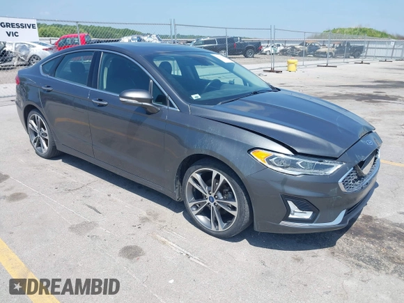 2020 Ford Fusion Titanium with VIN 3FA6P0D9XLR131042, listed as a IAAI auction lot 42560444 with 95,351 mi miles and . Bid and sale history available at DreamBid. Image 1.