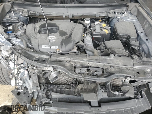 2021 Mazda CX-9 Grand Touring z VIN JM3TCBDYXM0516394, wystawiony jako Copart lot #52505215 z przebiegiem Nie podano mil oraz Szkoda całkowita • Salvage title. Historia ofert i sprzedaży dostępna na DreamBid. Obrazek 12.