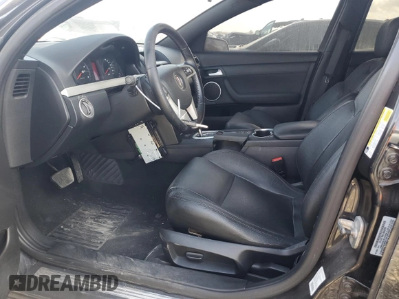 2009 Pontiac G8 z VIN 6G2ER57789L237107, wystawiony jako Copart lot #48974505 z przebiegiem 148 306 mil mil oraz Szkoda całkowita • Salvage title. Historia ofert i sprzedaży dostępna na DreamBid. Obrazek 7.